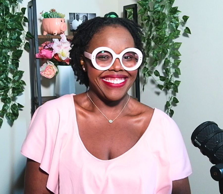 Toyia smiling in her podcast studio